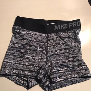 Black and grey nike pros